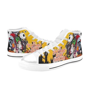 May include: White high-top sneakers featuring a yellow background with characters and text from "The Nightmare Before Christmas." The shoes have white laces and soles, with a black and white design on the sides.