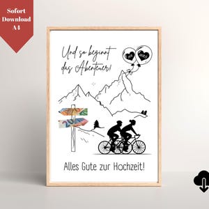 May include: A black and white illustration of a couple riding bicycles up a mountain road. The text "Und so beginnt das Abenteuer!" is at the top of the image. The text "Alles Gute zur Hochzeit!" is at the bottom of the image.