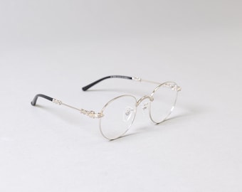 Montura ultraligera de titanio puro anti-luz azul antimiopía, monturas de gafas para hombres y mujeres, gafas de moda.