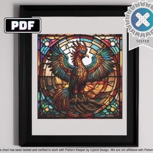 May include: A stained glass style cross stitch pattern featuring a colorful phoenix bird with red, orange, yellow, green, blue, and purple accents. The bird is surrounded by a stained glass window design.