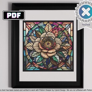 May include: A colorful stained glass design featuring a white rose with a yellow center. The rose is surrounded by green leaves and a rainbow of colors in the background.