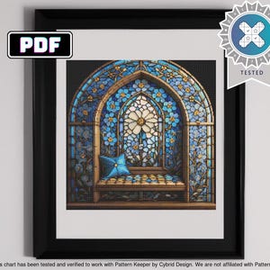 May include: A cross-stitch pattern depicting a stained glass window with a blue and white floral design. The window is arched and has a small bench in front of it. The pattern is labelled "PDF" and "TESTED".