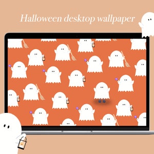 Può includere: Uno schermo di un computer portatile che mostra uno sfondo di Halloween con un motivo di fantasmi bianchi che tengono zucche e scope su uno sfondo arancione. Due fantasmi bianchi sono su entrambi i lati del computer portatile.