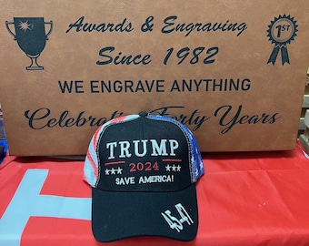 Trump 2024 Save America trucker hat with flag mesh and embroidered letters