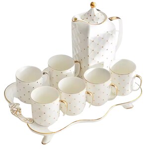 White Ceramic Tea Cup Set with Gold Accents