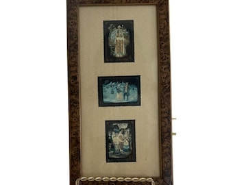 Juego de sellos de figuras con trajes típicos y escenas folclóricas de la URSS de 1977, enmarcado en madera de raíz.