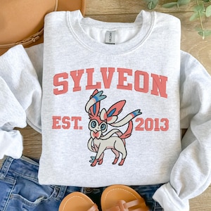 Anime Sylveon embroidered  sweatshirts. Child, Adult and toddler sizes available.