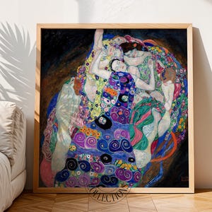 May include: A framed art print featuring Gustav Klimt's The Virgin, depicting a group of intertwined figures in a dreamlike composition. The artwork uses a rich palette of deep blues, purples, greens, and gold, with intricate floral and spiral patterns.
