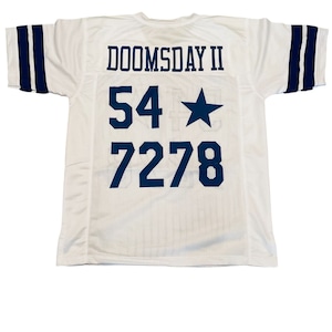 May include: White mesh jersey with navy blue accents. The jersey features the text "DOOMSDAY II" across the shoulders, with the numbers "54" and "7278" and a star graphic on the front. Navy blue stripes adorn the sleeves.