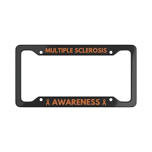 May include: Black license plate frame with orange text that reads "MULTIPLE SCLEROSIS" and "AWARENESS" with an orange ribbon symbol on either side.