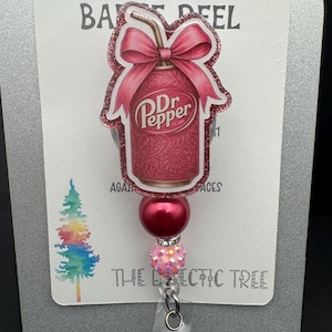 Coquette Dr Soda Can Badge Reel