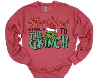 Mrs. Claus married to The Grinch