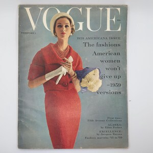 Vogue magazine Feb 1,1959. Elegant women wearing a red fitted wool suit. she is holding a white glove and a bouquet of white peonies. She is standing center of the magazine. With a description on one side. ''Fashion American women won't give up 1959"