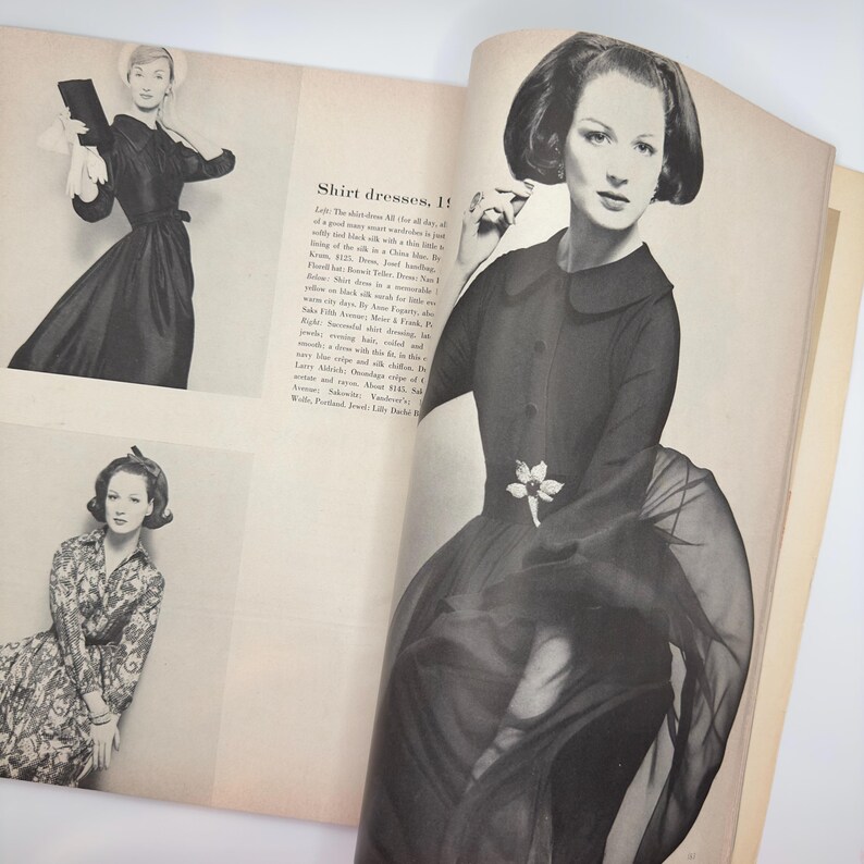 May include: A black and white magazine spread featuring two women wearing dresses. The text on the page reads "Shirt dresses!"