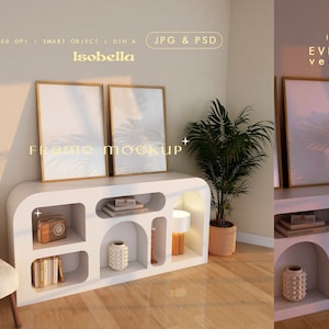 Puede incluir: Una estantería blanca con aberturas arqueadas, que incluye dos marcos de fotos dorados, una radio vintage, libros y un jarrón decorativo. La estantería está en una habitación con un sillón blanco y una planta en maceta.