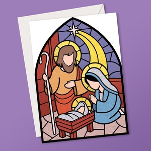 Karta z witrażem przedstawiającym scenę narodzenia Bożego Narodzenia.