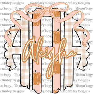 May include: A fall-themed design featuring the name "Aleigha" in a cursive font, overlaid on a monogram with pumpkins and a bow. The background has a plaid pattern and vertical stripes in shades of peach and tan.
