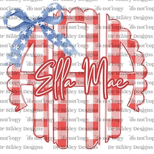 May include: A red and white gingham monogram with the name "Ella Mae" in a script font. A blue bow with white stars accents the top. The design is perfect for personalized gifts.
