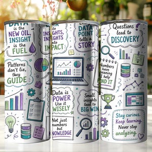May include: A cylindrical tumbler featuring a white background with colorful hand-drawn illustrations and text related to data analysis. Graphics include a laptop, magnifying glass, lightbulb, trophy, and charts, with phrases like Data is the new oil.
