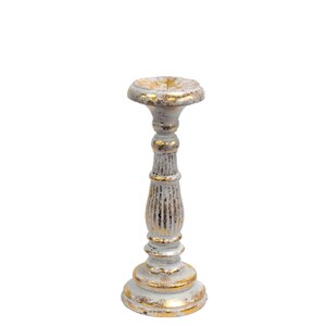 May include: White candle holder with gold accents. The holder has a round base and a tall, fluted column.