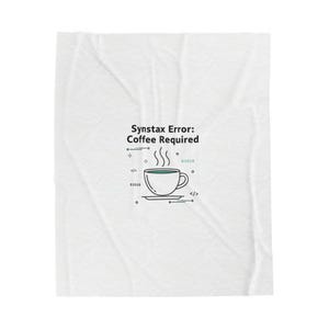 May include: White blanket featuring a teal coffee cup graphic with steam, binary code, and code symbols. The text "Syntax Error: Coffee Required" is above the cup, making it a fun gift for coders.