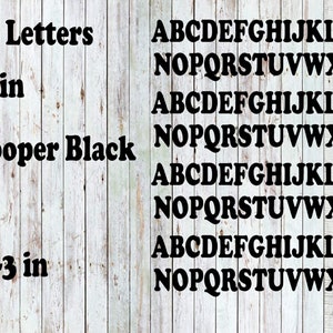 May include: 104 letters in Cooper Black font, shown in black on a white wood background. The letters are 0.53 inches tall.