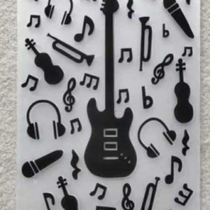May include: A clear, rectangular sheet featuring black silhouettes of musical instruments and notes. The design includes a guitar, headphones, microphones, violins, trumpets, and musical notes. The instruments and notes are evenly spaced across the sheet.