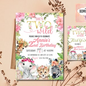 May include: A pink and gold invitation for a girl's 2nd birthday party. The invitation features a jungle theme with a giraffe, elephant, lion, and zebra. The text on the invitation reads "She's Two Wild" and "Annie's 2nd Birthday".