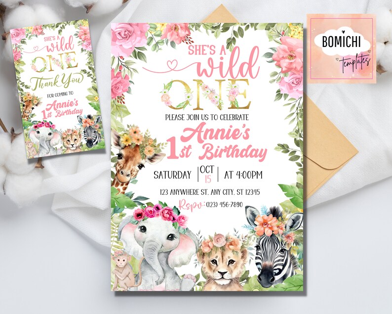 May include: A pink and gold first birthday party invitation with a jungle theme. The invitation features a giraffe, elephant, lion, and zebra with floral headbands. The text reads "She's a wild one" and "Annie's 1st Birthday".