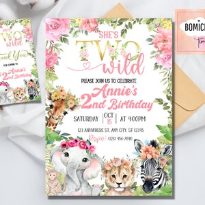 May include: Pink and gold birthday invitation with a jungle animal theme. The invitation says "She's Two Wild" and "Annie's 2nd Birthday".