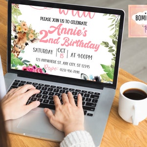May include: A laptop computer screen displaying a pink and green birthday invitation for a girl named Annie's 2nd birthday. The invitation features a giraffe with a flower crown and the text "PLEASE JOIN US TO CELEBRATE Annie's 2nd Birthday SATURDAY OCT 15 | AT 4:00PM 123 ANYWHERE ST. ANY CITY. ST 12345 RSVP: (123) 456-7890".
