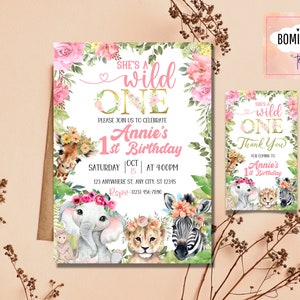 May include: A pink and gold first birthday invitation with a floral design and a giraffe, elephant, lion, and zebra. The text reads "She's a wild one Annie's 1st Birthday".