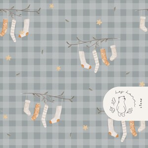 May include: A repeating pattern featuring socks hanging from branches, set against a grey plaid backdrop. The socks are in various designs, including solid colours, stripes, and star accents. Small stars and leaves are also included.