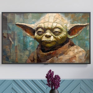 Pode incluir: Uma pintura emoldurada de Yoda, um personagem alienígena verde de Star Wars, com um estilo de mosaico. A pintura está pendurada em uma parede branca acima de um armário azul com um padrão de chevron.