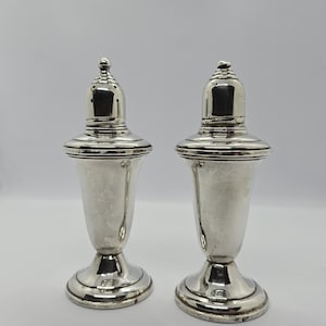 Antique Sterling Salt & Pepper Shakers by Empire. Weighted with glass. Solid Sterling Tops. 5&quot; tall.