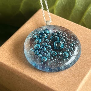 Handcrafted glass on 925 silver. Perfect statement necklace.