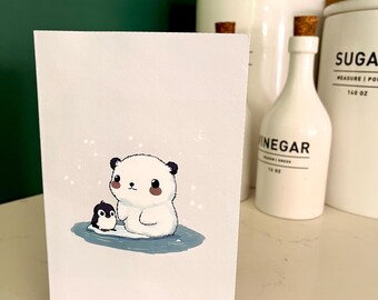 May include: A white card featuring a cartoon illustration of a polar bear and a penguin on a small ice floe. The polar bear is standing on the ice floe and the penguin is standing on the ice floe looking at the polar bear. The background is white with small white dots.