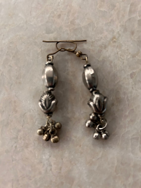 old silver earrings