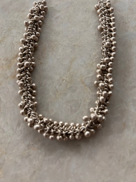 Delicate silver necklace with ghungroo