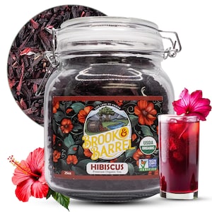 May include: A glass jar filled with dried hibiscus tea, labeled "Brook & Barrel Hibiscus Premium Organic Tea." A glass of red hibiscus tea with ice and a hibiscus flower garnish is also shown. A pile of dried hibiscus is in the background.