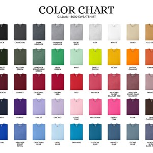 May include: A color chart for Gildan 18000 sweatshirts featuring a grid of 48 folded garment swatches in various shades including black, charcoal, grey, white, sand, gold, orange, green, red, pink, purple, and blue with labels for each.