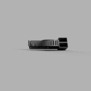 May include: A grey wall-mounted organiser with a circular rack and a rectangular compartment with two slots. The organiser is made of plastic and has a modern design.