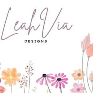 May include: A watercolor design featuring the name "Leah Via" in a cursive font, with the word "DESIGNS" below. The image is framed by a border of colorful flowers in shades of pink, orange, yellow, and green, set against a white background.