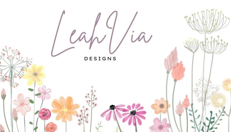 May include: A watercolor design featuring the name "Leah Via" in a cursive font, with the word "DESIGNS" below. The image is framed by a border of colorful flowers in shades of pink, orange, yellow, and green, set against a white background.