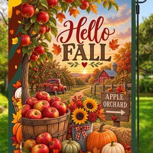May include: A rectangular garden flag featuring a vibrant autumn scene with a large wooden basket overflowing with red apples, orange pumpkins, sunflowers, and a red truck in an orchard. The text Hello FALL is printed in brown script and block letters.