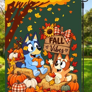 May include: A rectangular garden flag featuring a blue and a red-orange cartoon dog sitting on hay bales surrounded by pumpkins and autumn leaves. A wooden sign with a plaid bow displays the text FALL Vibes in dark brown lettering against a green background.