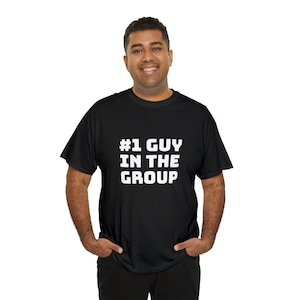 May include: A black t-shirt with white text that reads "#1 GUY IN THE GROUP".
