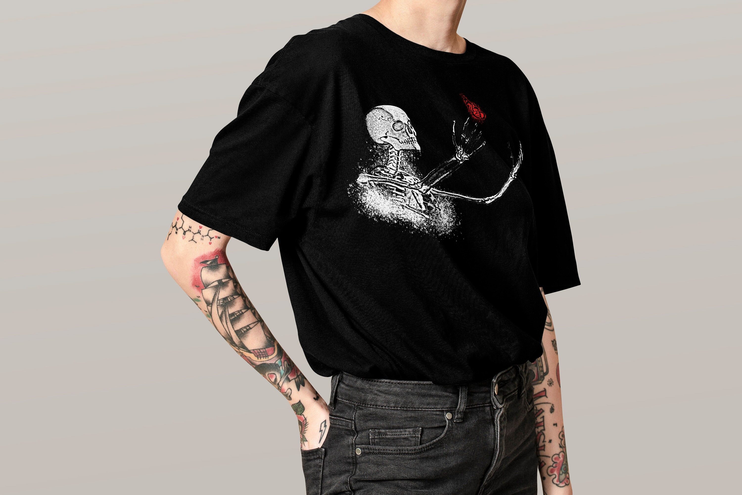 Discover Gothic Curious Skeleton With Butterfly Shirt | Spooky Vibes T-Shirt | Halloween Gift Unisex Cotton Tee