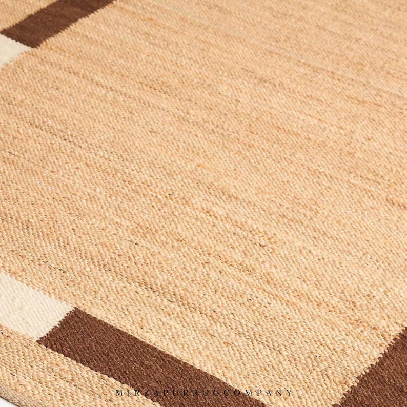 flat weave jute rug, floral jute rug, eco-friendly rug, sustainable home decor, vintage rug, bohemian jute rug, boho chic rug, handwoven jute rug, natural fiber rug, rustic rug, farmhouse decor rug, floral pattern rug, botanical rug, jute floral runner, braided jute rug, soft jute rug, handmade jute rug, organic home rug, neutral rug, beige jute rug, jute living room rug, entryway rug, natural area rug, country cottage rug,