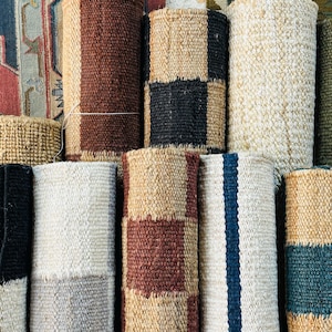 sustainable gift idea, botanical themed rug, floral entry mat, nature-inspired rug, all-season jute rug, hand knotted floral jute, rustic natural beauty rug, elegant jute décor, warm jute texture rug, thoughtful earth tone rug, and organic home piece.